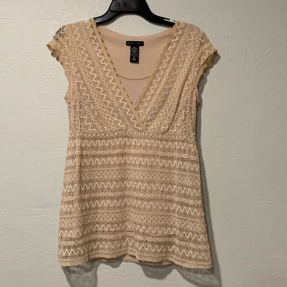 Women’s tan patterned blouse
